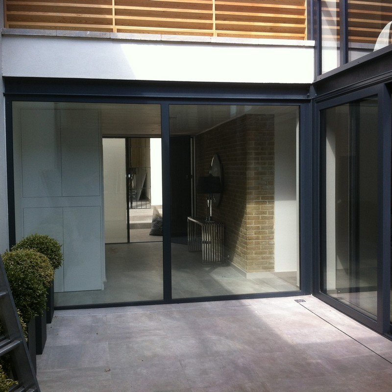 Floor-to-ceiling sliding doors opening to courtyard in Tufnell Park