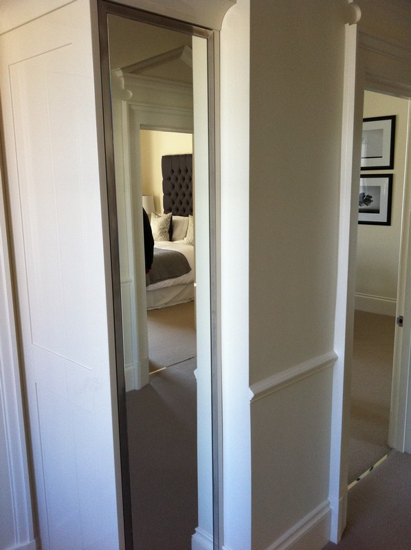Full-length wardrobe mirror fitted in Tufnell Park home